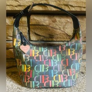 Vintage Dooney & Bourke With multicolored zipper.